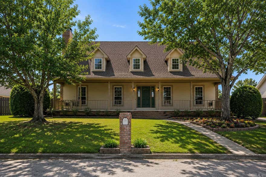 Immaculately kept and move-in ready! This spacious 3 bed, 2.5 bath home offers 3,202 sqft with THREE bonus rooms and endless flexibility. Downstairs bonus room features built-in hooks and storage, perfect for a mudroom, craft room, or office. Upstairs bonus areas could serve as a second den, game room, dedicated 4th bedroom, or guest suite with private side entry and deck access. New roof in 2024, tankless water heater, wired for fiber internet, Ring security system, and separate laundry room. Oversized insulated side-loading 3 car garage includes utility sink and abundant storage. Huge covered front porch with porch swing, fresh mulch and landscaping, sprinkler system front and back on separate meter, plus large fenced backyard with new double gate and multi-level deck. Interior features include granite countertops, bay window in kitchen, large brick fireplace with custom built-ins, wood beam ceiling accents, intercom system, beautiful wood details throughout, and many large new double-paned windows. Spacious primary suite offers his and her closets and vanities. New appliances, fresh paint, and freshly cleaned carpets complete this exceptional home!