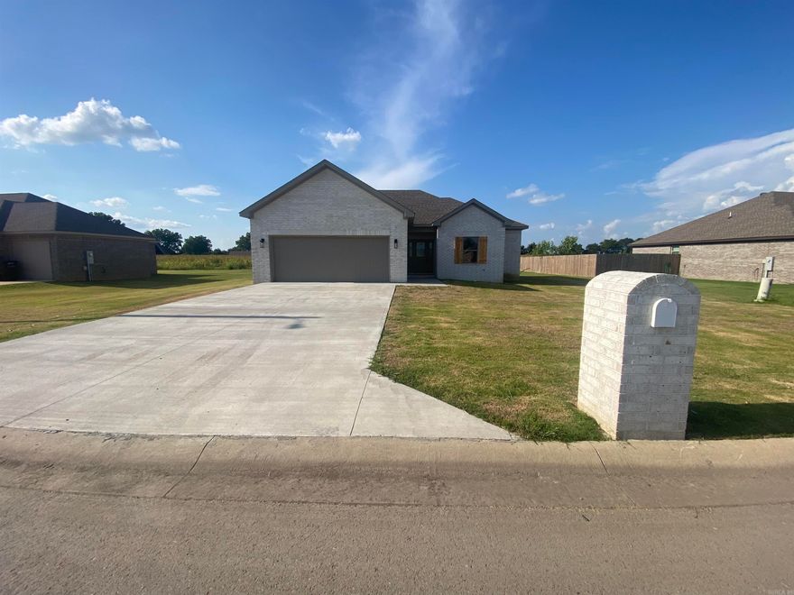This NEW construction is a must see at well under $250,000! It's complete with a fireplace, covered back patio, split bedroom plan and even a matching mailbox. Neutral paint and LVT flooring throughout. Book your tour today!