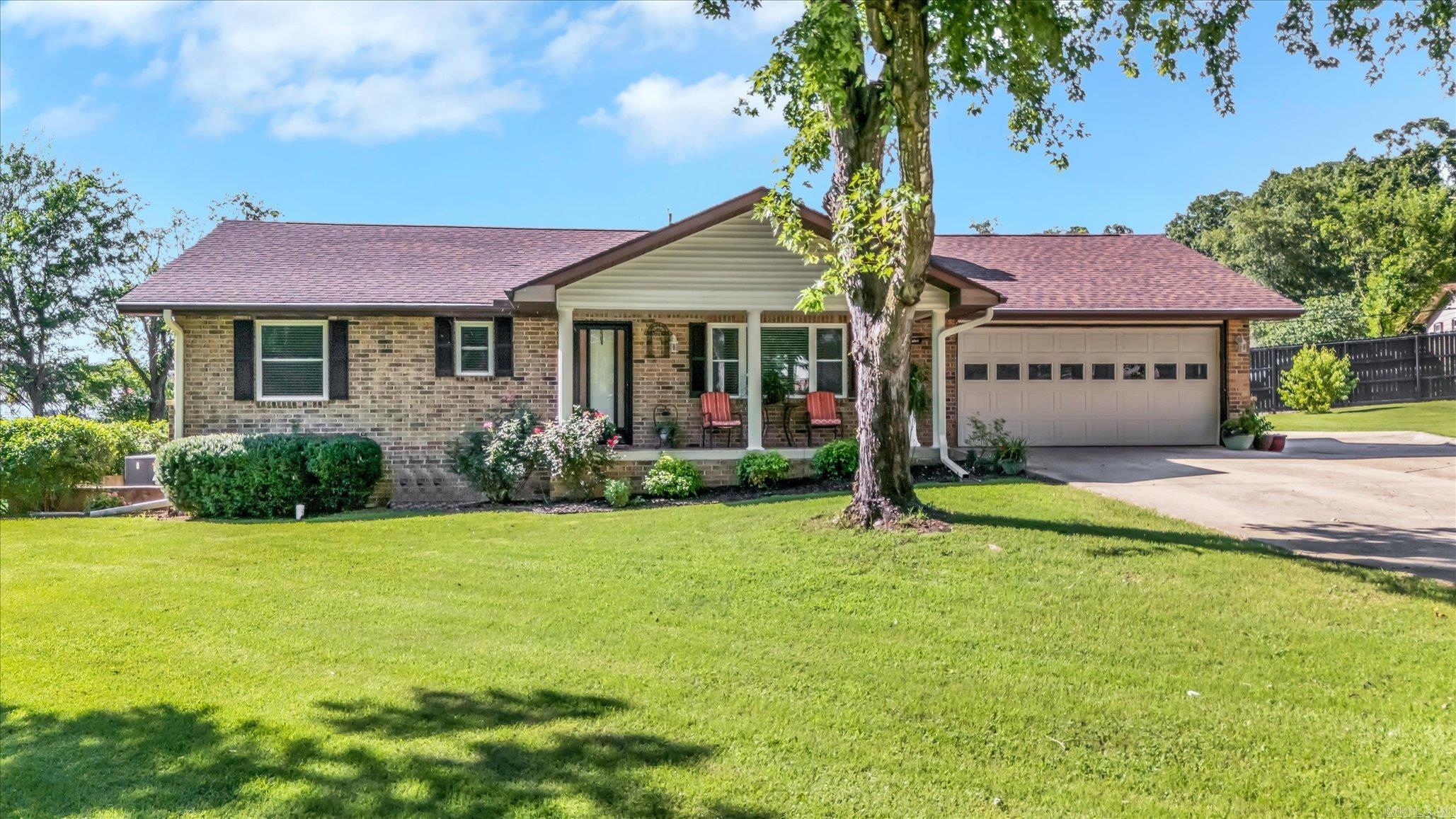 This updated 2-bedroom, 2-bathroom home is move-in ready! Upgraded since 2020 with a new roof (2022), water heater, flooring, windows, gutters, and a fireplace. The completely renovated kitchen features custom cabinetry and sleek new appliances, which convey. The beautifully reimagined sunroom adds a bright and inviting space to relax. Nestled in a cul-de-sac, this in-town gem is just a short walk or drive from restaurants and shops. Boat awing and shed convey with sale.