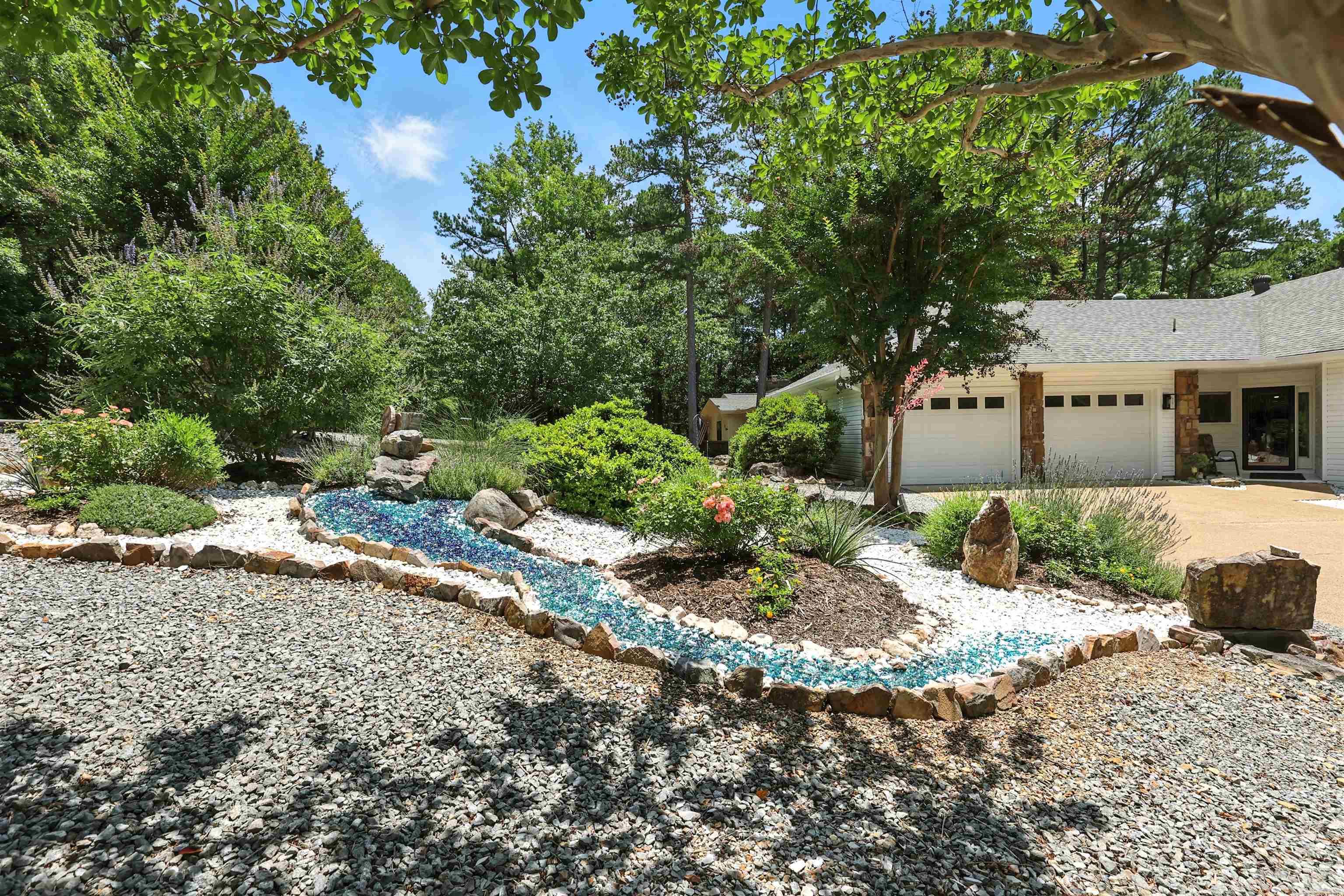 This beautifully updated 3-bedroom, 2-bath home combines comfort, style, and peace of mind all on one level! Step inside to discover remodeled bathrooms and a tastefully modernized kitchen featuring newer appliances that make everyday living a breeze. LVP throughout and no popcorn! The 2.5-car garage offers extra space for a workshop, storage, or golf cart, while the whole-home generator ensures you’re always powered up—rain or shine. Outside, enjoy the beauty of professional landscaping that adds both curb appeal and a tranquil backyard retreat. There is a firepit and lovely patio deck! Nestled in a quiet corner of Hot Springs Village, this home offers more than just upgrades—it offers a lifestyle.