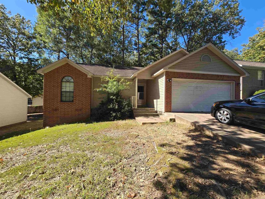 Opportunity Awaits! One level 3 be 2 bath home offers potential—perfect for a homeowner ready to make it their own, a long- or short-term rental, or a possible flip. With a little work, this property could truly shine! Open great room with cathedral ceilings has a spacious and inviting layout. The galley-style kitchen, bayed dining area and bar provide a cozy flow for everyday living and refrigerator conveys. The primary suite includes a walk-in closet, and the secondary bedrooms have nice size closets across from the hall bath. Level backyard with small deck and partially fenced. Oversized garage has storage or workspace and easy to reach furnace & HWH. Priced to sell, Sold strictly AS-IS, No Repairs. APPOINTMENT ONLY- Please see agent remarks.