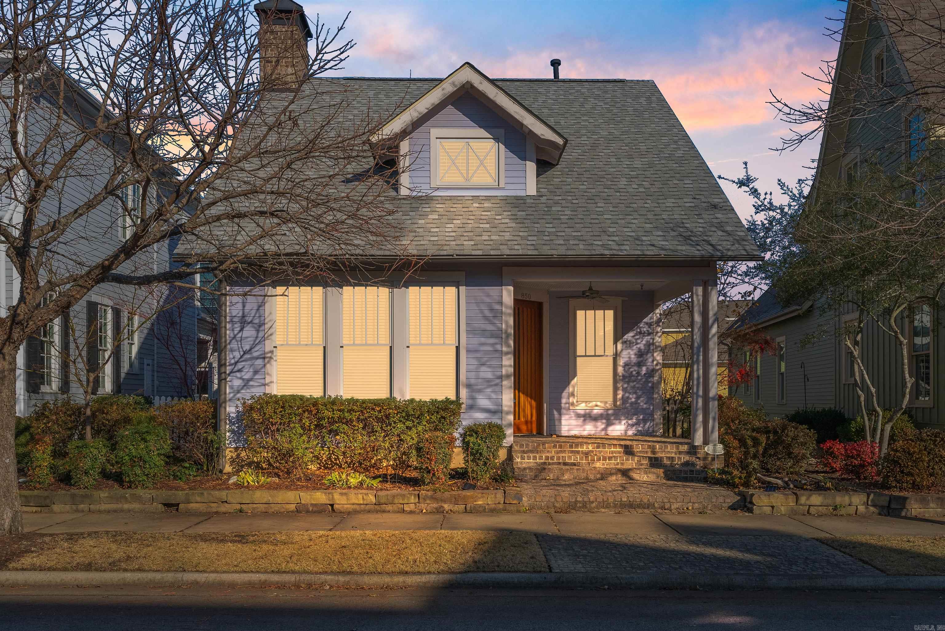 Become a part of the charming and unique Village at Hendrix neighborhood! The neighborhood has many activities and "get togethers" if you would like to attend you would be more than welcome. This lovely home features 2 bedrooms and 2.5 bathrooms in the main house and a studio apartment over the garage that is currently rented and fully furnished. This area would also be great as a guest cottage, mother-in-law quarters or game room, so many possibilities! The main house features a sunroom, beautiful wood and tile floors, marble counter tops, luxurious sinks in the bathrooms and towel warmers, new roof in 2024, new ref. in 2024, fireplace with gas logs or could be used as a wood burning fireplace, gas stove and washer and dryer convey. The studio apartment features beautiful hardwood floors, granite counter tops, stackable washer/dryer combo and custom Murphy bed in the sleeping area. The apartment also has a seperate parking pad in the back by the stairs. Don't delay! Schedule your private showing today and become a part of the village at Hendrix neighborhood today. Look forward to seeing you! AGENTS PLEASE SEE SHOWING REMARKS
