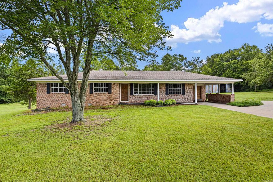 Restore and reap the benefits. Much of the demo has been completed bring back the finish to your own personal taste. Owners have chosen to stop where they are and give you the choice on floor covering, paint and appliances and best of all they have elected to price it accordingly. Slightly less than 5 acres detached shop fronting on HWY 64 and backing up to interstate 40. Just minutes from the Pope Johnson County line. Cash or in-house bank finance required in the house present condition.