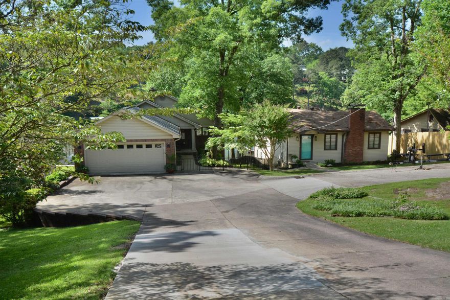 EXCEPTIONAL FAMILY COMPOUND ON LAKE HAMILTON FEATURING TWO BEAUTIFULLY UPDATED HOMES BEING SOLD TOGETHER. THE PRIMARY RESIDENCE 210 EDGEWATER OFFERS 4 BEDROOMS , 3.5 BATHS, SPACIOUS LIVING AREAS, OVER 3000 SQ FT, TWO STALL BOAT DOCK WITH TWO LIFTS AND SWIM PLATFORM PERFECT FOR LAKE LIVING & ENTERTAINING. 208 EDGEWATER INCLUDES 2 BEDROOMS, 3 BATHS, & MURPHY BED FOR THE ADDTIONAL GUEST ACCOMMODATIONS, ALONG WITH IT SINGLE STALL BOAT DOCK.   BOTH PROPERTIES FEATURE LAKE IRRIGATION, UPDATED INTERIORS, AND CONVENIENT ACCESS TO ALL THE DINING, SHOPPING, MEDICAL AMENITIES OF TOWN.  A RARE OPPORTUNITY TO OWN A MULT-HOME WATERFRONT RETREAT IDEAL FOR EXTENDED FAMILY, VACATION LIVING, OR INVESTMENT POTENTIAL.