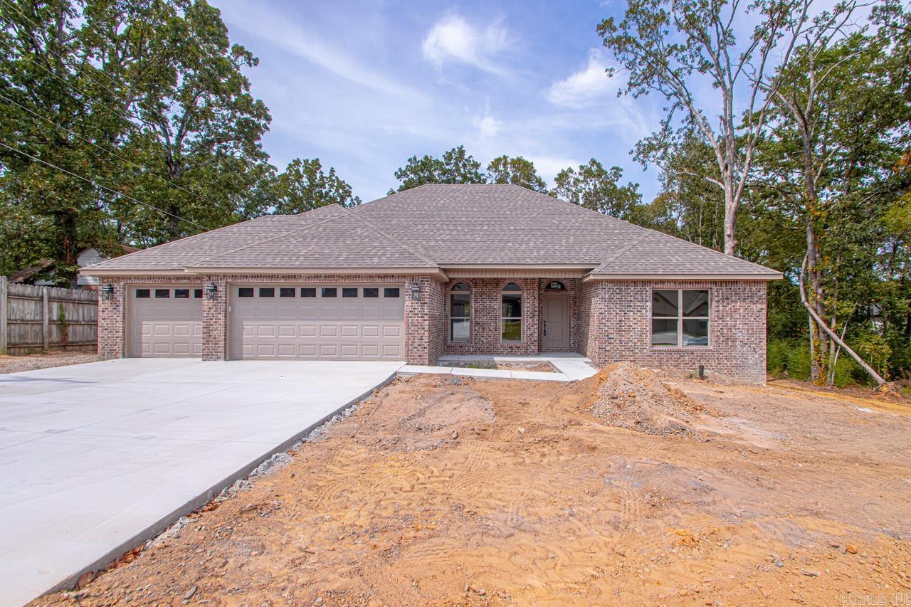 This home is 95% done. Pictures are from the same house built previous. Welcome HOME! 4 bdrm! 3 bath! 3 car large garage! Large family room w/ fireplace, dining room at one end! Split floor plan! Two bdrms have Jack n Jill bath! Large primary bdrm w/spa bath! Walk in shower and corner soaking tub! Plenty of storage throughout! 4th bedroom would make a great office!  Large deck on the back! Come see it today! Nice big lot! You are just going to love it! Room for everyone and everything has a spot! Really nice floor plan!