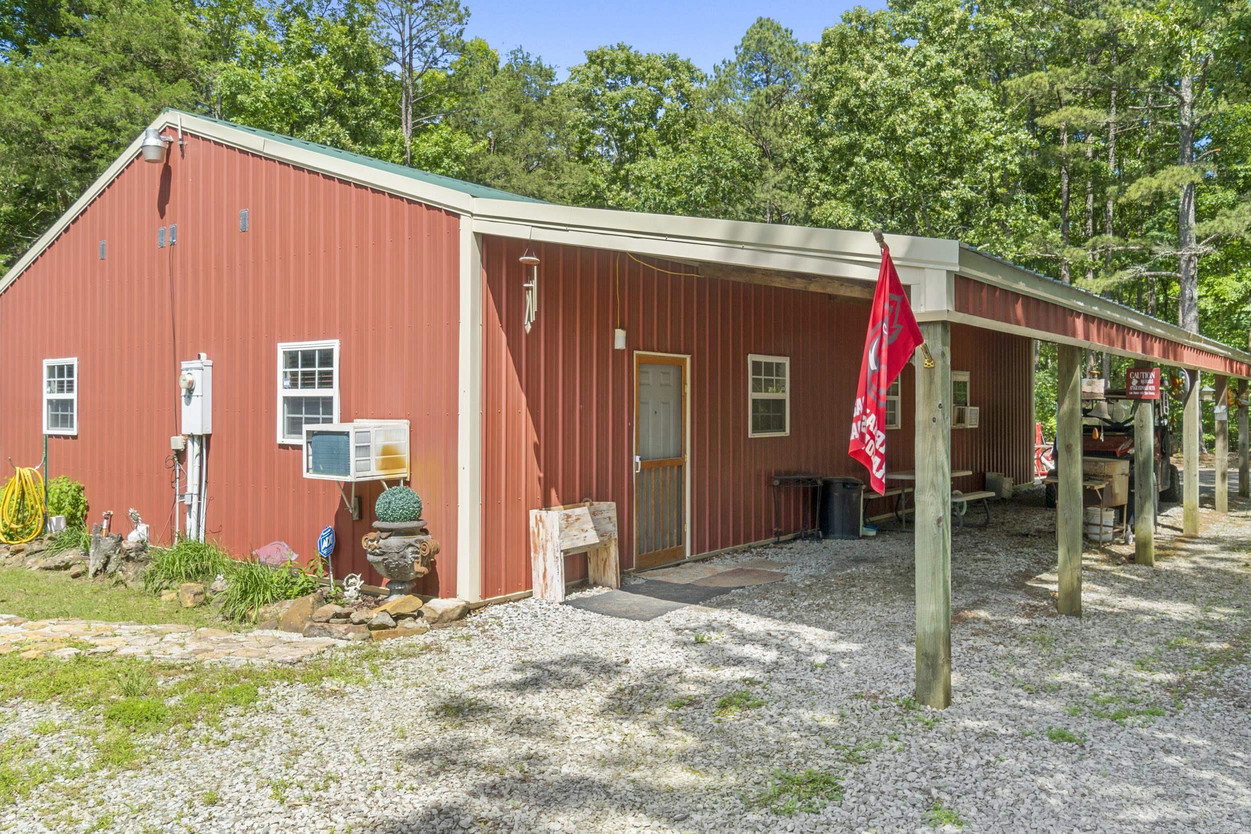 Private, non-restricted, wooded, 10 acres with 3 bedrooms, 2 baths home and an office space that could be used for another bedroom. 30x40 Shop with electricity. Camper carport with electricity. Above ground pool with a deck and fire pit. Back patio is wired for a hot tub. Two electric insert fireplaces. Road is paved up to the property with a gravel driveway. Home has two tankless water heaters (one gas and one electric). Heating and Cooling system consist of two electric wall units. Great Greers Ferry and Little Red River get away spot with room for your boat, jet ski, and camper. Approximately 4 miles to Cove Creek boat launch. For those who enjoy hunting or viewing wildlife, deer and turkey are frequently seen. A quiet retreat with a tremendous view of the stars at night.
