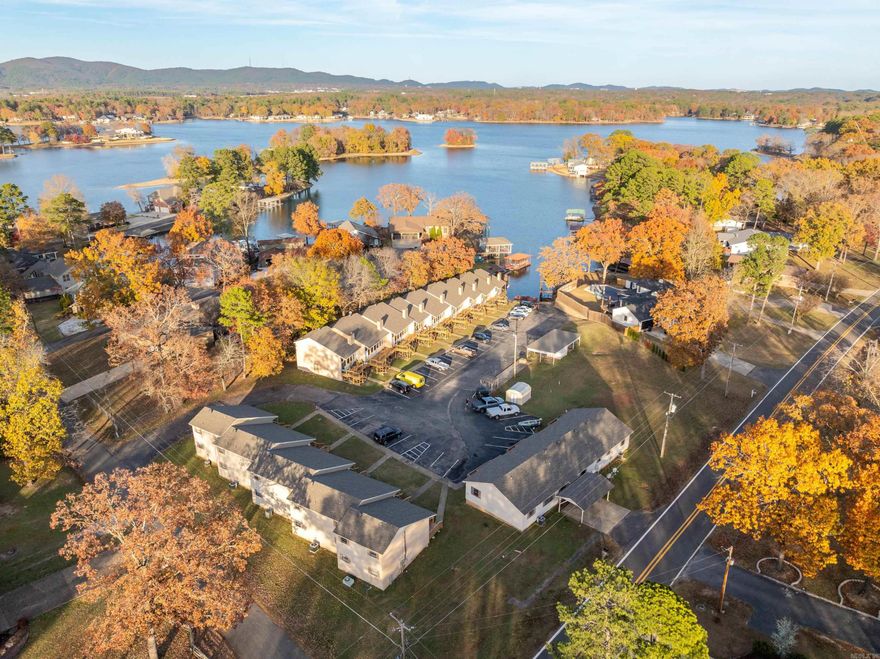 Discover an incredible investment opportunity with this 17-unit multi- family condominium complex, located on the shores of Lake Hamilton in Hot Springs, Arkansas. Boasting a market net operating income (NOI) of $195,738, this property promises solid returns and exciting growth potential. This lakefront complex is not only a secure income-generating asset but also a unique opportunity for further development in a highly desirable location. A designated area within the lot is ready for the construction of up to 7 additional 3-bedroom,2-bathroom units, providing an opportunity to increase revenue and enhance the property’s value.