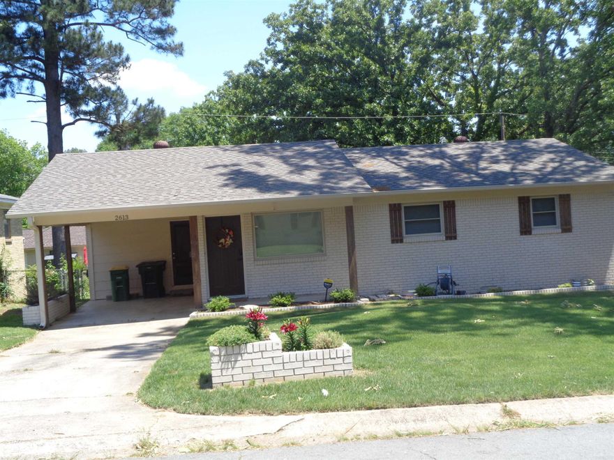 If there is a better looking, more updated, well-cared for home in Little Rock let me know because this all brick, 3 bedroom 2 bath house is so sharp. The owners have made this a beauty from the roof to the foundation. It has a new roof, new deck, new flooring, new windows, new kitchen cabinets, new granite counter tops, a new breakfast bar island, a new master bathroom, new hall bathroom, new patio door, new plumbing, new hvac units, new landscaping, new gas range, new micro-wave, new dishwasher and a new refrigerator which conveys with also the washer & dryer. Agents please check remarks.