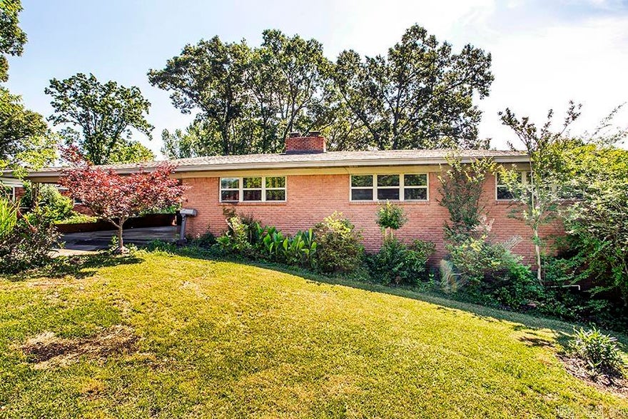 Great investment opportunity with endless potential! This spacious 2,517-square-foot home offers 4 bedrooms and 3 full bathrooms, making it an ideal property for investors, renovators, or buyers looking to create their dream home.The main level features a generous living room, a large kitchen with ample space for gathering and entertaining, and a cozy formal living room. Three bedrooms and two full bathrooms are conveniently located on the main floor.The lower level provides excellent additional living space, including a large family room, one bedroom, a full bathroom, and a laundry room. There is also an unfinished area that offers plenty of storage or the opportunity to renovate and add a fifth bedroom or bonus room. Situated on a large lot, the property includes a long driveway and a two-car carport. The fully fenced backyard features a deck and a nicely sized yard, perfect for outdoor entertaining, pets, or gardening. This home needs some updating and tender loving care, but with its spacious layout, versatile lower level, and excellent lot size, it presents an outstanding opportunity to add value and make it your own.
