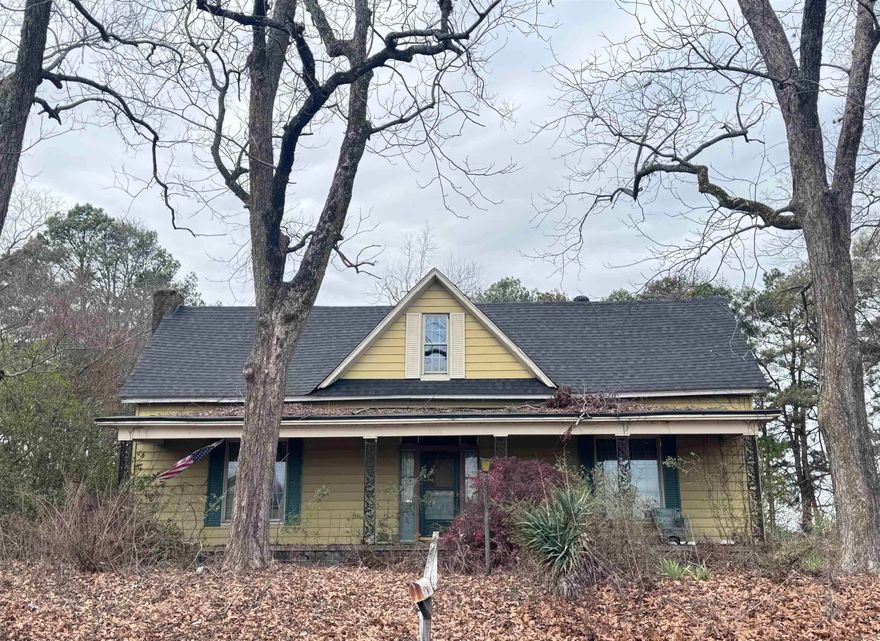 Investment opportunity! Lots of potential for investors looking for their next project. Inside, you'll find 12-foot ceilings and a wood-burning fireplace highlighting the home's original charm. Recent improvements include a new roof in 2022 and updated windows in 2018 with a lifetime warranty. This property will require work and cleanup, making it ideal for investors, flippers, or handyman buyers ready to bring this home back to life and maximize its potential.