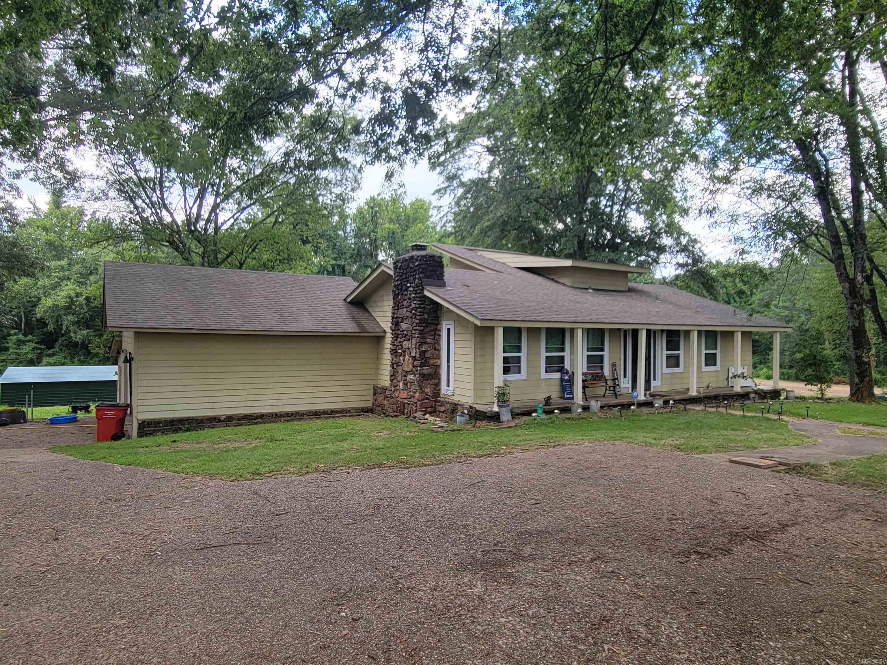 Looking for a 3 bedroom, 3 bathroom home located on a sprawling 3.20-acre lot within the city limits! Be welcomed by inviting wood floors that flow throughout the living room, creating a warm and cozy atmosphere. The kitchen is a chef's dream, boasting an abundance of cabinets for ample storage space. In addition to the formal dining room, this home also features a spacious den/sunroom, offering plenty of space for entertaining guests. An oversized laundry room, providing extra storage for all your needs. The second bedroom is equally impressive, featuring a walk-in closet and a full bath for added comfort and privacy. Upstairs, you'll find another bedroom and full bath! This home has recent updates including a new roof installed in 2019 and new windows in 2020. Showings available now!!! More Photos Coming Soon!