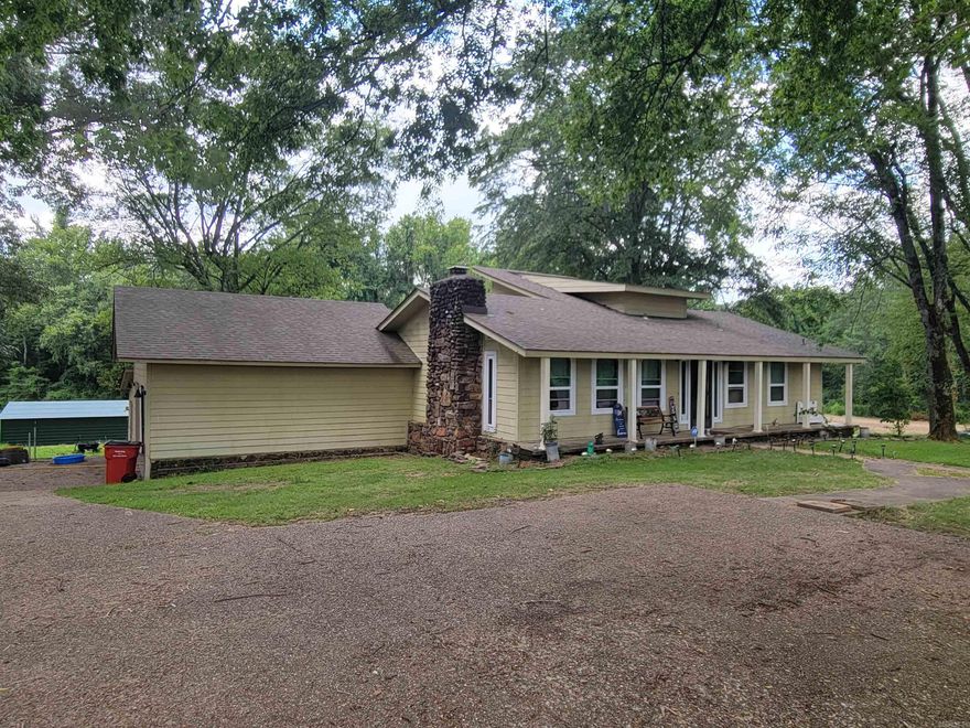 Looking for a 3 bedroom, 3 bathroom home located on a sprawling 3.20-acre lot within the city limits! Be welcomed by inviting wood floors that flow throughout the living room, creating a warm and cozy atmosphere. The kitchen is a chef's dream, boasting an abundance of cabinets for ample storage space. In addition to the formal dining room, this home also features a spacious den/sunroom, offering plenty of space for entertaining guests. An oversized laundry room, providing extra storage for all your needs. The second bedroom is equally impressive, featuring a walk-in closet and a full bath for added comfort and privacy. Upstairs, you'll find another bedroom and full bath! This home has recent updates including a new roof installed in 2019 and new windows in 2020. Showings available now!!!   More Photos Coming Soon!