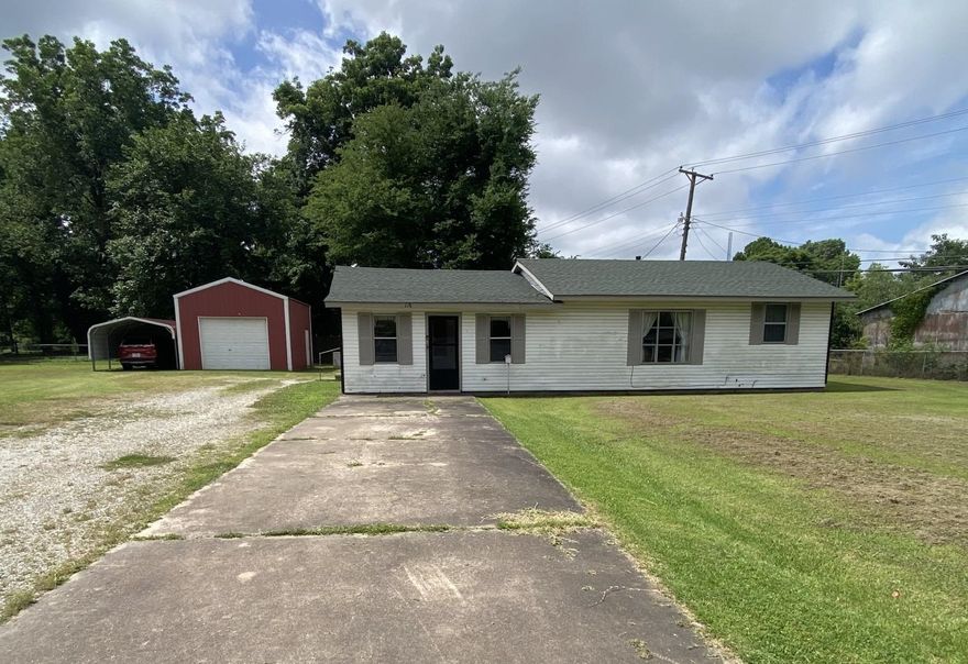 2020 roof, 3 bedroom 1 bath, detached garage/shop on large city lot. Additional storage building and carport.