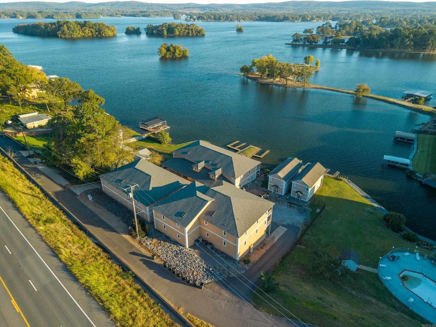 Discover your perfect Hot Springs retreat! This beautifully furnished 2-bedroom, 2-bathroom lakefront condo offers the ideal blend of comfort, convenience, and investment potential. Nestled in the Lakeside School District, this unit sits directly on the shores of Lake Hamilton with stunning water views and easy access to boating, dining, and entertainment. Currently an active short-term rental with excellent guest reviews and a strong rental history, this property is turnkey and ready to continue generating incomeāor to become your private lakeside escape. Step inside to find an inviting open-concept living space with updated furnishings, a fully equipped kitchen, and a private balcony perfect for enjoying Arkansas sunsets over the water. Both bedrooms are generously sized, and each bathroom is tastefully finished for a comfortable stay. Located just 10 minutes from Oaklawn Racing Casino Resort, and close to shopping, restaurants, and downtown Hot Springs attractions, this condo offers the best of lake life and city convenience. Whether youāre looking for an investment property, vacation home, or permanent lakeside residence, this condo checks every box!