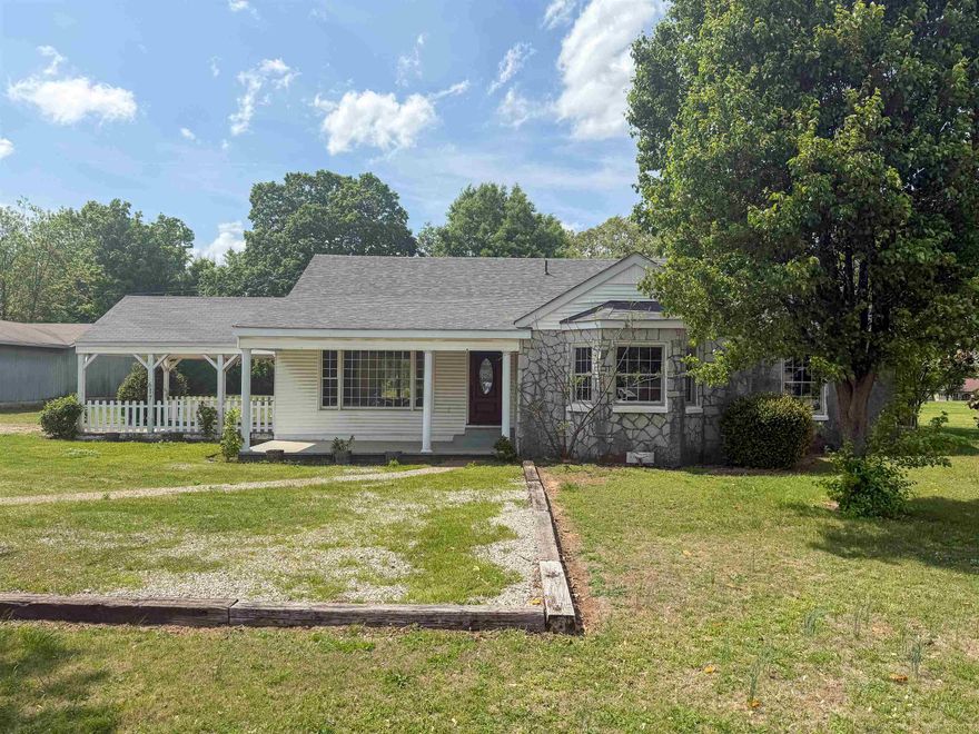 Dual-Purpose Professional/Residential! This iconic rock home combines the enduring strength of classic Ozark architecture with modern interior updates, sitting on a spacious one-acre lot with abundant parking. Perfectly positioned for a variety of uses, this property is a must-see for both homeowners and business professionals alike. For the professional, this high-visibility location is a turn-key solution for a professional needs. The layout features three spacious rooms ideal for private offices, one and a half baths, and a large central area with large windows perfect for a reception desk or client waiting gallery. The oversized parking area ensures easy client access, while the generous one-acre lot provides ample room for future expansion. For the homeowner, this three-bedroom residence offers the peace of mind that comes with a home built to last, featuring a fresh, updated interior and a roof less than four years old. The timeless character of the exterior rock work is matched by modern comforts inside, all situated on a beautiful, level acre that offers plenty of room for gardening or a private shop. Don't miss out on one of the area’s most flexible listings. Call Today!