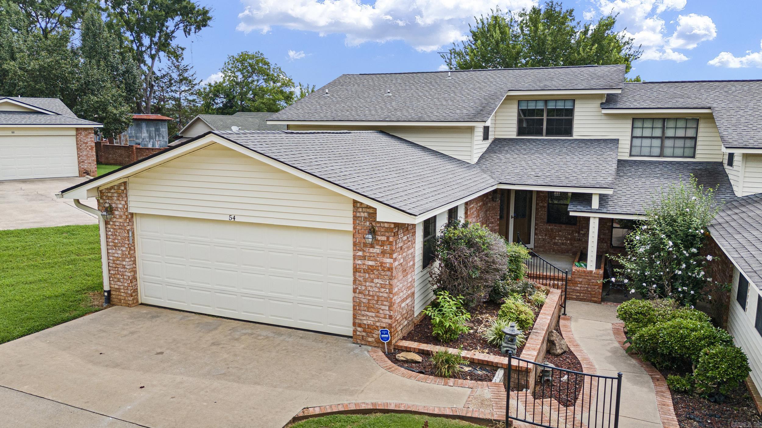Welcome to this newly remodeled home in one of Russellvilleās most desirable gated communities, located near the Russellville Country Club Golf Course. This 3-bedroom, 2-bath property offers an open-concept layout with fresh, modern paint throughout. From the moment you walk in, youāll notice the attention to detailāupdated countertops, stylish fixtures, and clean and large spaces. Enjoy the ease of low-maintenance living in a secure, gated neighborhood while still being just minutes from town. Whether youāre downsizing, relocating, or simply looking for a beautiful place to call home, this one checks all the boxes. Gated community. Fully renovated. **Some photos are virtually staged** Directions: Start in Russellvilleāget onto AR-7 North / North Arkansas Avenue heading toward Dover. Continue on AR-7 North for roughly 8 miles. As you approach Dover, turn left onto Club Road Village (there should be signs marking the gated community). Follow Club Road Village until you reach 54 Club Road Village.