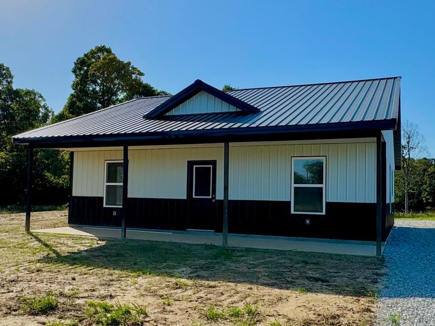 NEW CONSTRUCTION HOME ON 1.2 ACRES!  This new 2 bedroom, 2 bath home offers the perfect blend of modern design, comfort, and simplicity. Featuring an open floor plan with vaulted ceilings in the living area. The kitchen offers lots of cabinet space with a breakfast bar. The master suite has an attached full bathroom as well as a walk in closet. This home was built to be energy efficient with spray foam insulation. There is a nice front porch on the home as well as a back patio.  Conveniently located with privacy Additional 1.2 acres available for $15,000.  Call for more details!