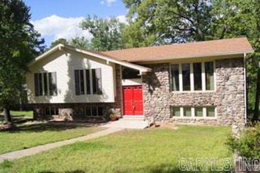 Lovely, quiet family home at the end of a cul-de-sac in the heart of WLR, just minutes from I-430/I-630.  Large bedrooms, two living areas (one with a fireplace), plus office or 4th bedroom, open kitchen with newer appliances, pantry, loads of storage space.  Huge fenced backyard, side loading garage with insulated doors.  Leafguard gutters, new roof 2010, air 2012. Refrigerator and washer/dryer to convey.