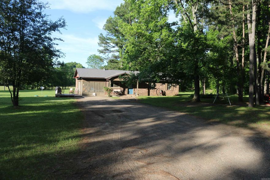This is the one! This exceptional 50 +/- acres is located in the Ouachita Mountains of rural Scott County, Arkansas. The property is definitely one of a kind. With a remodeled 3 bedroom, 2 bath home with a screened-in porch, deck, and built-in gas fireplace; beautiful, well-maintained pastures with cross-fencing; and a few old-growth oaks, the country living here is at its finest. The rolling hills of the Ouachita Mountains to the south of the property, all National Forest, make for easy access to some great hunting and exploring. This property sits on the famous Fourche La Fave River, which has excellent fishing and recreational experiences waiting to be had. With not one but two off-grid style camping huts on stilts, it makes for the perfect evening settings or weekend getaways for individuals who want to unplug from the fast pace of everyday life. With wildlife from ducks in the winter, whitetail deer, turkeys, and bears, this property has the potential to be the perfect base camp for the avid hunter who is looking for it all. This property is located approximately 20 minutes from Waldron, 30 minutes from Mena, and 45 minutes from Fort Smith.