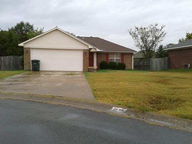 Beautiful home with granite countertops, tile floors, and an open floor plan.