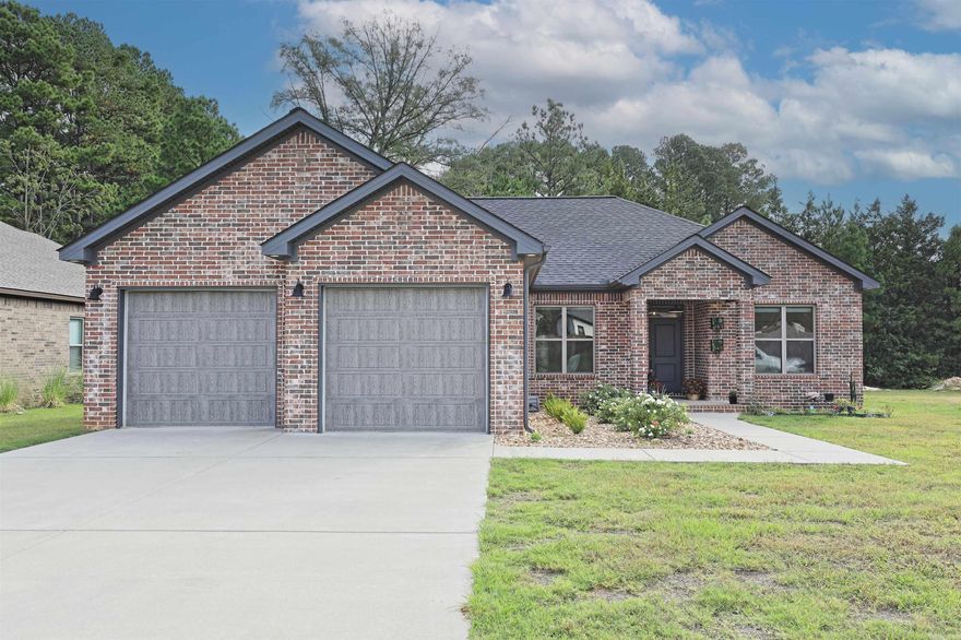 BEAUTIFUL HOME IN A GATED SUBDIVISION! This amazing home has an open concept split floor plan, with luxury vinyl plank flooring throughout.  A cooks dream kitchen with quartz, large island with a sink, a large pantry, and top of line appliances.  The master suite boast a large master bath with double vanities, custom tiled shower and a soaker tub for relaxing after a long day. A large closet opens to laundry room that makes it extra easy for accessing. Step outside to a fenced in back yard and extra landscaping.  A wonderful neighborhood  to take walks and enjoy such a great place be with country feels and yet close to all your amenities!