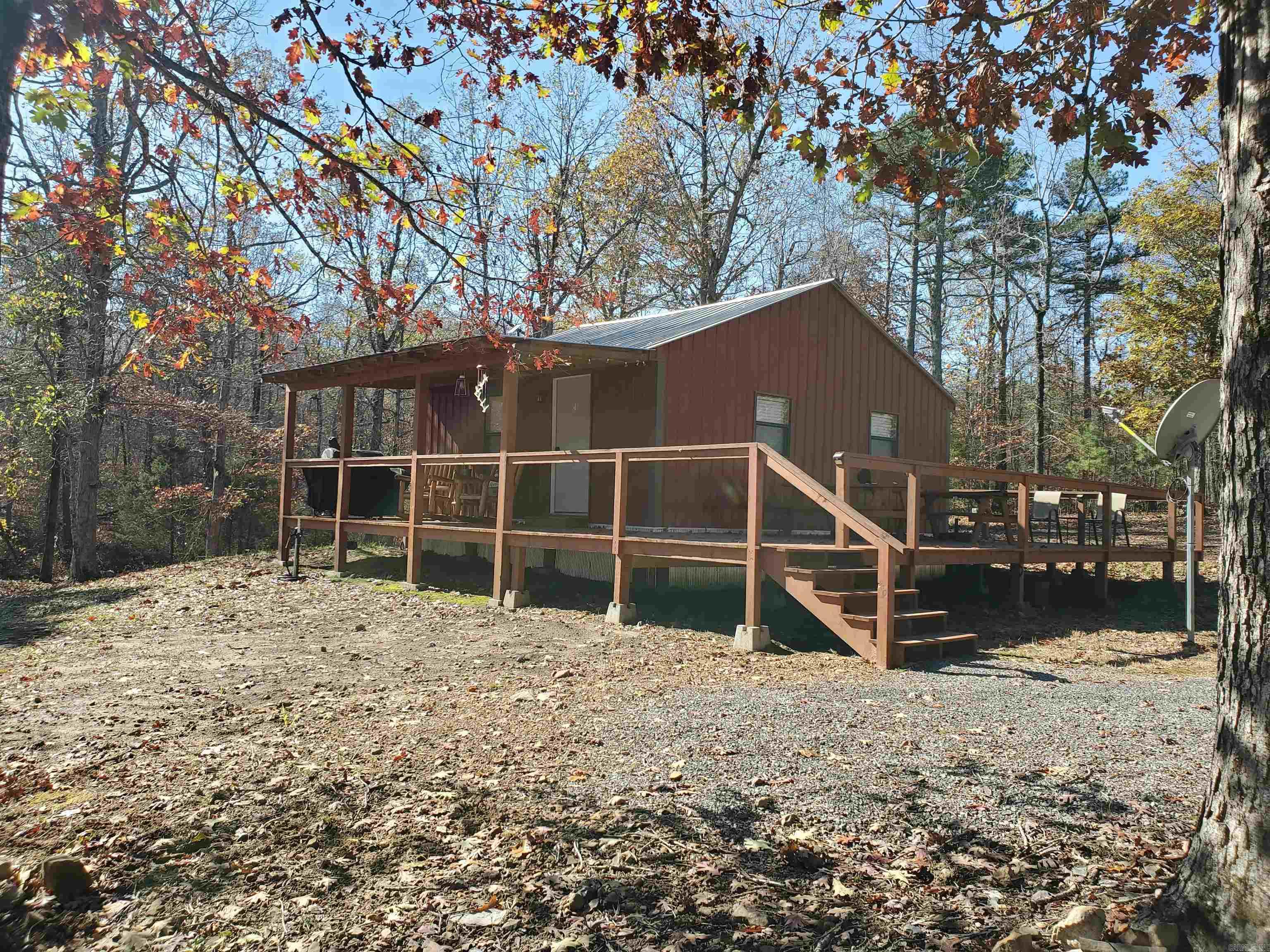 Escape to the woods & discover this beautifully remodeled cabin tucked away on 14.64 acres of serene, wooded land. Whether youāre seeking a peaceful getaway, an outdoor adventure, or an investment property, this fully furnished, turn-key cabin is ready for you to enjoy or rent out as an Airbnb or VRBO. The cabin has metal siding, metal roof, vinyl plank flooring, new appliances including washer/dryer. Explore the 14.64 acres, ideal for hiking, hunting, or simply unwinding in nature. A separate section of land on the property has its own electric meterāperfect for adding another cabin or selling off if you prefer. Located just 40 min from the stunning Greers Ferry Lake, this cabin offers easy access to water activities, boating, and fishing. If you love hunting, you're just 45 minutes away from public land with abundant hunting opportunities & just 1.5 hours from Branson, MO. With close proximity to recreational spots and outdoor adventures, this property provides the perfect balance of seclusion and convenience. Use it yourself, and when youāre not there, generate income by renting it out to visitors looking for a rustic getaway in the woods.