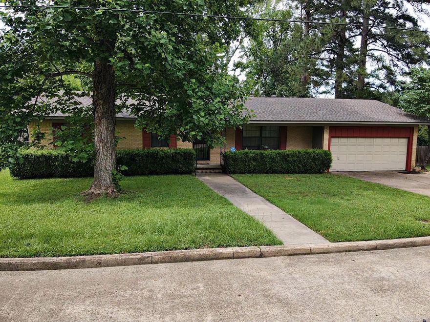DECK THE HALLS at 2838 Sylvia Street with this MOVE IN READY, Spacious 3-4 Bedroom, 2 Bath brick home. Home is all electric boasting 2 wood burning fireplaces and 1905 sq ft. Kitchen is a cook's delight with lots of counterspace and room to entertain. Gather the family for a nice sit down meal in the dining room.   Hobby/Craft/Office or bonus room-could even be 4th BR. Brand new hot water heater, new roof in 2021. Spacious primary bedroom and bath with walk-in shower. Relax on the wooden deck and watch the kids or fur-babies play in the fenced back yard. Enclosed 2 car garage-with automatic door. Conveniently located in an established neighborhood with shopping, schools, and hospital nearby. Call today.