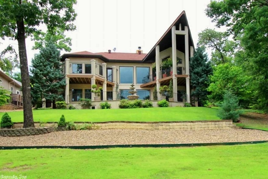 ARCHITECTURAL BEAUTY PERCHED ABOVE #18 GREEN OF PONCE DE LEON GOLF COURSE. TRULY UNIQUE QUALITY. EXPANSIVE OPEN FLOOR PLAN WITH FLOOR TO CEILING WINDOWS TO TAKE ADVANTAGE OF THE GORGEOUS VIEW.LARGE  KITCHEN IS A DREAM FOR AN OWNER WHO ENTERTAINS. MASTER SUITE IS GENEROUS WITH JETTED TUB LOCATED TO ENJOY NATURE'S CREATION.PRIVATE GUEST BEDROOMS ARE HOUSED IN THE LOWER LEVEL. HUGE FINISHED STORAGE ROOM OVER 1100 SQ FT. IMMACULATE LANDSCAPING COMPLETES THIS PRETTY PICTURE...WELCOME HOME.ROOF 2015.