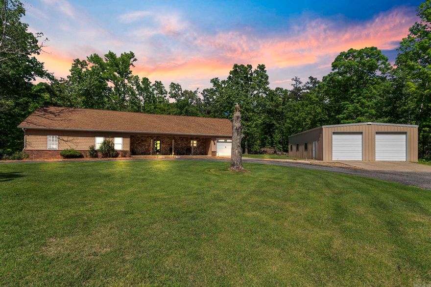 Sprawling estate on 10.22 acres with gated entry into private subdivision with 100's of surrounding acres. The location is an easy commute to Little Rock or Conway. This 3 bedroom 2 bath home has it all including a 30x50 shop w/ elec.& water., RV pad with elec. & holding tank and 16KW back-up generator. You will be amazed by the large open living area with a wall of windows opening to a beautiful view of the surrounding nature. Relax in the spacious master bedroom or go for a soak in the master soaking tub. Ready for adventure? Get out ATV's and enjoy the cleared ATV trails through the property connecting to many AR Wildlife managed trails. What an Arkansas dream home! Get in to see this property today! (Agents see private remarks for a full list of updates)