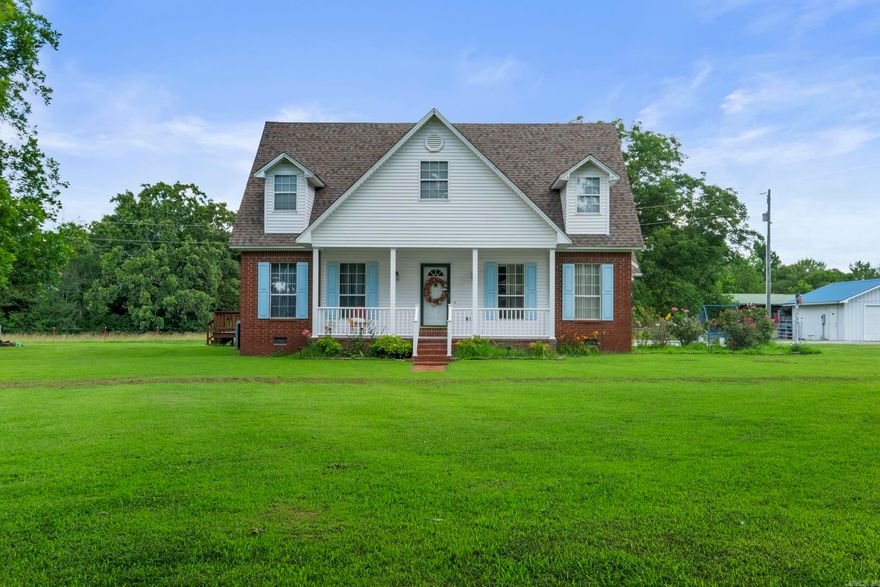 This builder used to say "I don't build fancy but it'll be solid and dirt dobber proof"  This house is just that!  1 1/2 stories with two huge bedrooms and a full bath upstairs master, living area kitchen and dining downstairs.  Wood floors with very little carpet upstairs.  Seller did an addition to the house at the back making the garage a big office, game room, family room or whatever you want it to be and put a big carport at the back.  There is an extra garage for all those lawn mowers or other toys all this sitting on 4 acres.  There is some additional acreage that could be purchased around the home. See agent for details.  Square footage of the home is estimated.  Pecan trees a other big trees offer some really nice shade for these hot days.