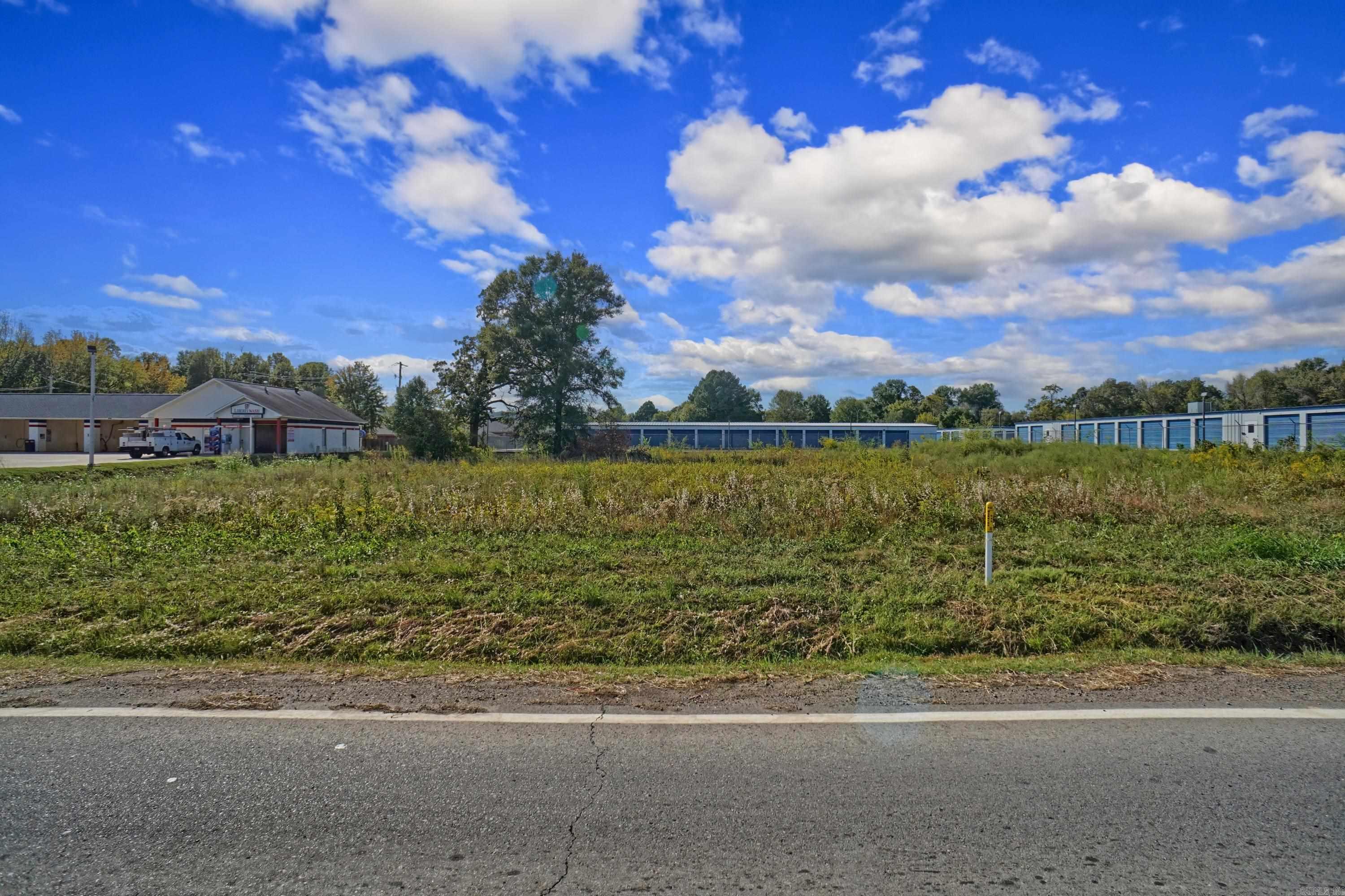 **Prime Commercial Lot in Russellville, Arkansas - .86 Acres MOL!** Discover an excellent opportunity for your business with this strategically located .86-acre commercial lot in the heart of Russellville. Boasting high visibility and easy access from major roadways, this property is perfect for a variety of ventures. Surrounded by a thriving community and established businesses, the generous size allows for flexible building options to suit your needs. Don't miss your chance to establish your business in this growing market—contact us today for more details!