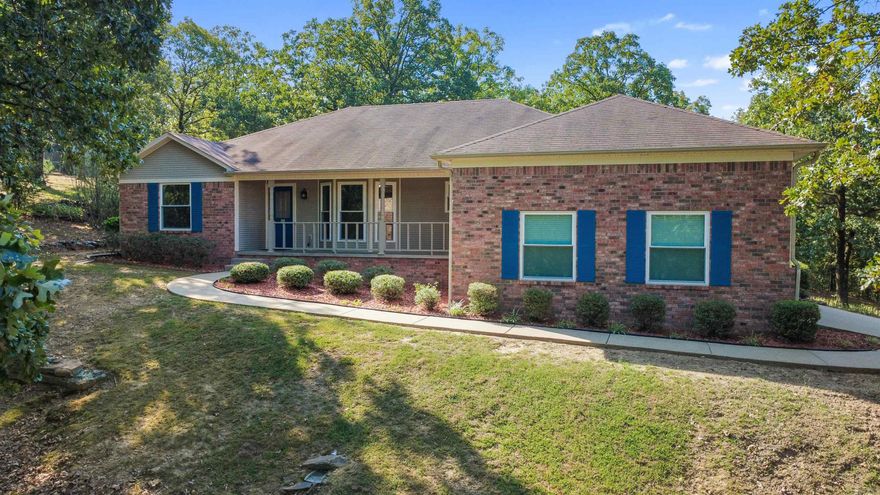 This beautiful home sits on 5 peaceful acres and is the perfect blend of comfort and charm. Inside, you’ll find three generously sized bedrooms and two full baths, along with a bright eat-in kitchen with pantry. A large den with a cozy fireplace creates the perfect gathering space for family and friends. Updates include new windows (2022) and fresh paint throughout, giving the home a crisp, move-in ready feel. The two-car garage provides plenty of storage, making everyday living easy. Step outside to enjoy a spacious covered porch, manicured flower beds, and permanent raised garden beds—a gardener’s dream come true! Two storage buildings offer even more flexibility, with one featuring electricity and air conditioning, perfect for hobbies, projects, or extra space. Here, you’ll enjoy the peace and privacy of country living while staying close to schools, shopping, and community conveniences. ? A home where comfort, charm, and nature come together—ready to welcome you! ? See Agent remarks