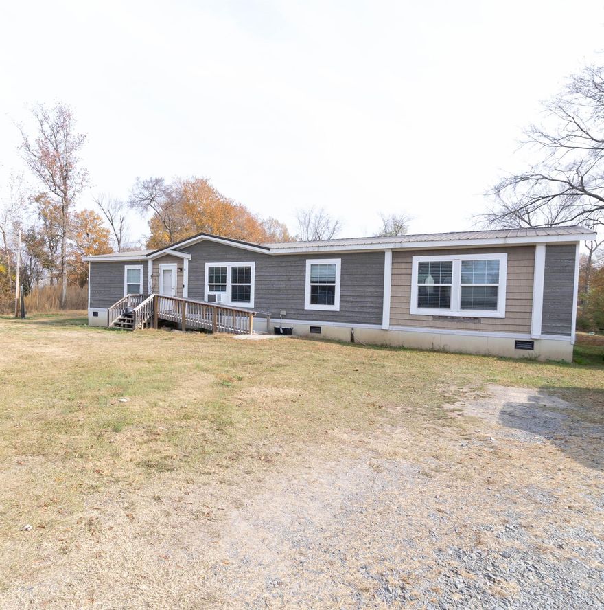 Welcome to this less than 10 year old home with a beautiful lake view.  The spacious 3 bedroom 2 bathroom property has a nice open concept as well as a recently replaced hot water heater.  This home sits on almost 2 acres giving plenty of room for additional outbuildings or outdoor activities. Agents please see remarks. Book your showing today!