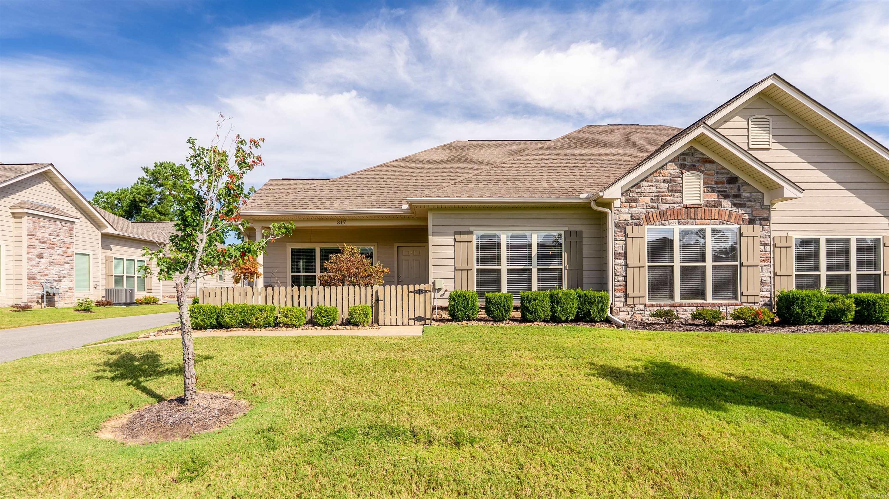 If youāre looking for hometown vibes with city amenities, this oneās for you! Built in 2018, This is an amazing one level, 3 bed 2 bath home in the Mountain Terrace Estates. As you enter the home you are greeted with the elegance of an open-concept great room with kitchen, dining, and living all together for effortless entertaining. A cozy fireplace and tons of natural light make this space one youāll want to spend all of your time in. The well equipped kitchen features stone counter tops, lots of storage, and stainless appliances. The split floor plan of this home offers two spacious secondary bedrooms with a shared bath and a large primary suite featuring ensuite bath with double vanity, walk in shower, and an incredibly spacious walk in closet. Upgraded finishes in the home include hardwoods throughout, tile in wet spaces, and fixtures. A level lot and private garage finish out this home as the premier available unit in Mountain Terrace Estates. Don't miss the beautifully constructed club house and pool for entertaining and family fun! Weāre excited for you to come and make it yours! 317 Mountain Terrace Circle in Maumelle Welcome Home!