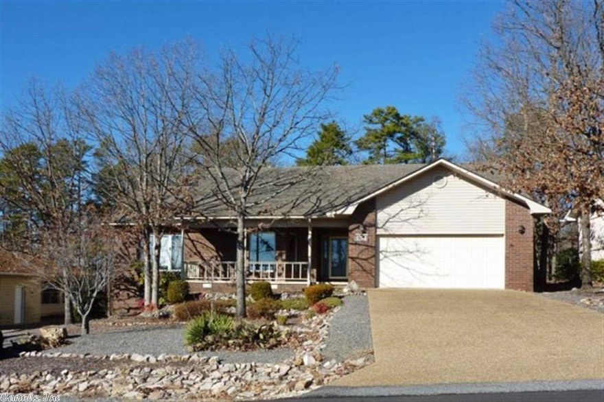 NEW PRICE on this Charming brick & vinyl home in a great view area neighborhood.  Open plan with split bedrooms, and spacious living-dining room w/nice brick fireplace with gas logs.  Large eat-in kitchen w/ lots of cabinetry w/ pull out shelves, black appliances, & pantry area. Spacious master suite w/large BR, and bath with double sinks, walk in tub, walk-in shower, tile floor, and large walk-in closet.Cconcrete front porch with mtn.view across street. New Interior Paint, Updated HP & Roof..GREAT BUY!!!