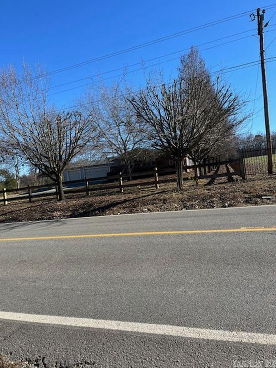 2 beautiful acres with double wide mobile home with 3 car garage