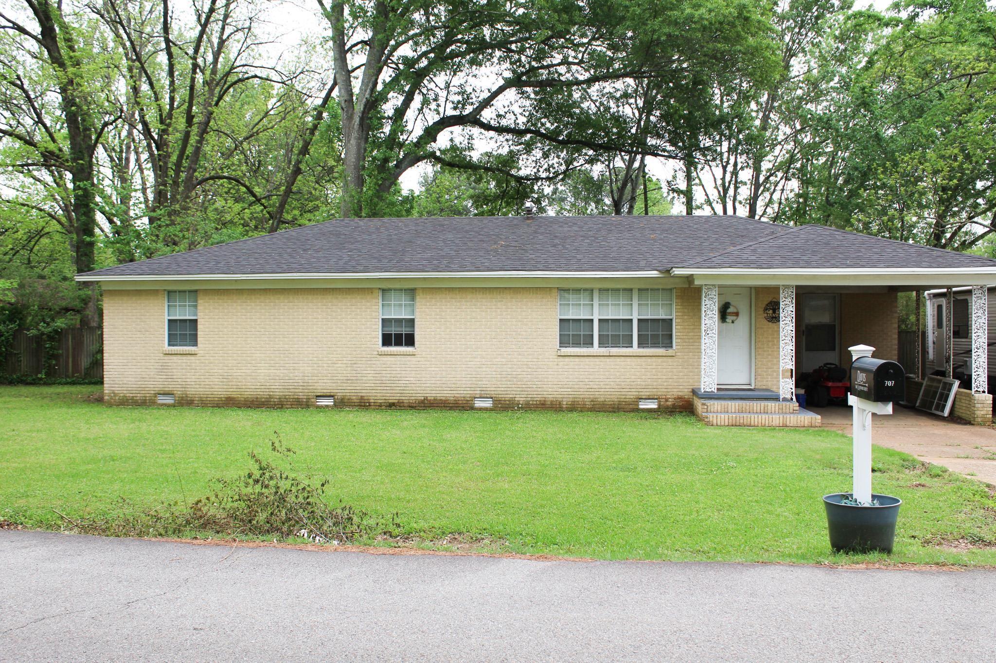 Nestled just off of highway 16, this charming home presents an incredible opportunity for first time homebuyers or an investment group. Its prime location ensures you're only moments away from the vibrancy of Race St, the heart of Searcy, where shops, dining, and entertainment abound. The residence itself strikes the perfect balance between modern living and cozy comfort. The kitchen boasts stainless steel appliances and ample cabinet space, making it a haven for culinary enthusiasts. The bathroom has undergone a stunning transformation, now showcasing a timeless design that will appeal to all. In 2018, the property saw a significant improvement with the replacement of the roof, adding to the home's value and peace of mind for the new owners. Outdoor living is a breeze with the spacious covered back deck, an ideal setting for barbecues, serene relaxation, or lively entertainment. The generous yard, fully fenced, offers a safe and private oasis for pets to roam and children to play, making this home a complete package. Whether as a delightful starter home or a strategic investment property, this gem is sure to capture the hearts of those looking for their own slice of Searcy.