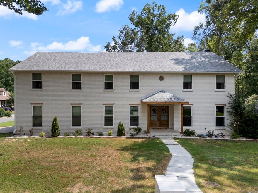 Welcome home! This stunning, fully remodeled home is ready for its new family. As you step inside, you'll be impressed by the spacious layout and large outdoor deck that's perfect for entertaining. This home features 4 bedrooms, including two master suites, 3.5 baths, a main floor office, a lovely sunroom, a spacious living room with fireplace, and a versatile bonus room upstairs. Enjoy modern updates like new Café kitchen appliances, fresh paint, new flooring, updated baths, and more! (See last photo for the complete renovation list.) Situated on 0.47 acres with a storm shelter, sprinkler system and storage building, this gorgeous home is just a short golf cart ride from the Maumelle Country Club Golf Course. Located in a quiet neighborhood with walking paths and private access to the Arkansas River, this property is a true gem worth discovering, schedule your showing today!