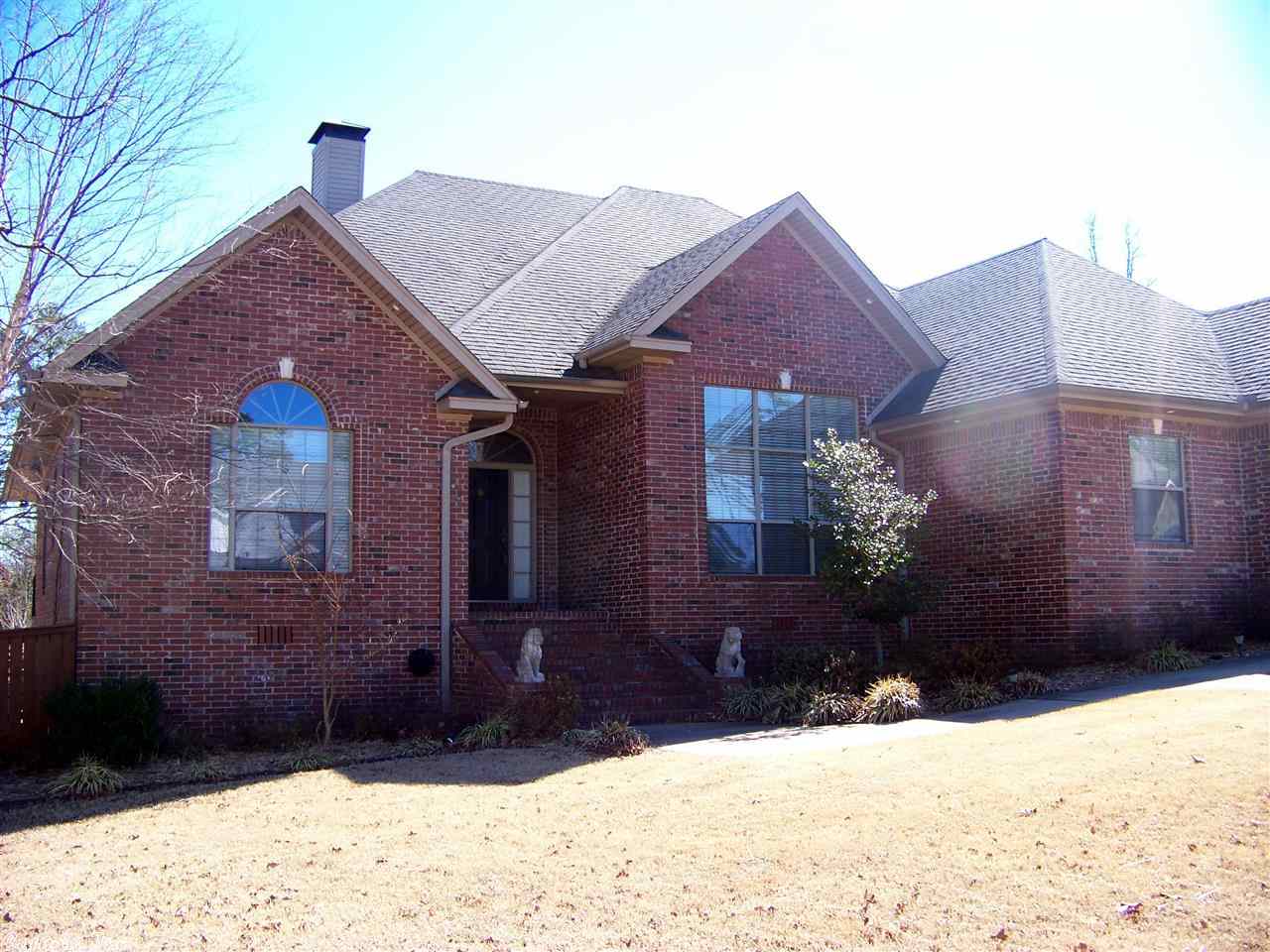 Baby Baby! This 5 Bedroom, 3 bath Greystone Beauty has all the bells and whistles expected in a home of this caliber. Great room area open to formal dining. Well appointed kitchen with double ovens, granite & breakfast bar. Master bedroom has seating area and fireplace, walk in closets, jetted tub, walk in shower and more. Upstairs boasts large game/family room with it's own fireplace, full bath and two bedrooms. Office area downstairs can be used as 5th bedroom. Golf cart garage, backs up to woods.