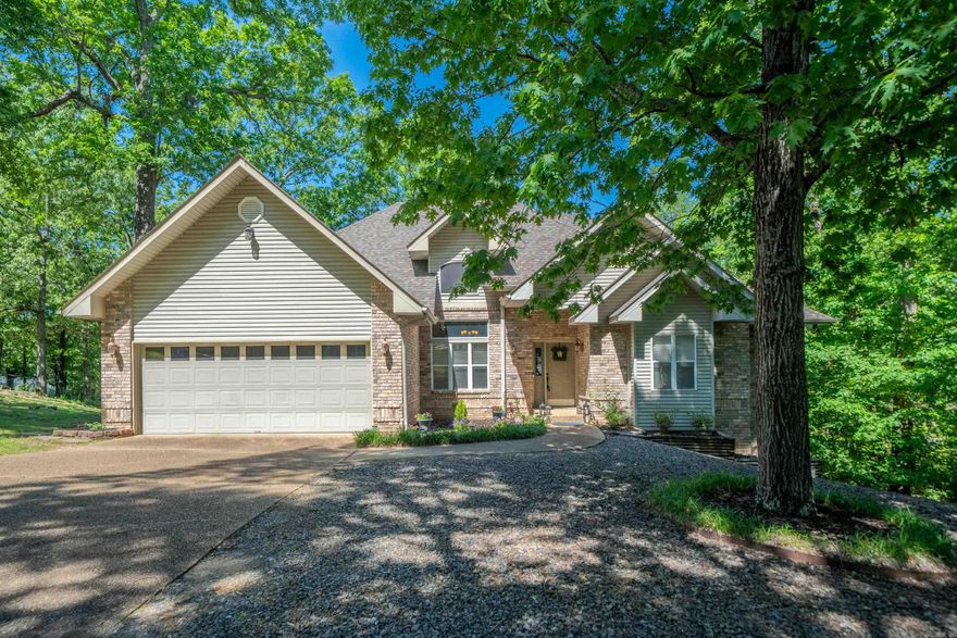 Welcome to this beautifully maintained home in the heart of Hot Springs, where modern updates meet comfortable living. This spacious residence offers 2,659 square feet of thoughtfully designed living space, featuring 3 BR's & 2 full BA's. Step inside to discover a home that's been lovingly updated w/an eye for both style & functionality. The fresh paint throughout creates a clean, contemporary canvas for your personal touch. The welcoming living room is anchored by an elegant fireplace with a 2018 custom mantel, perfect for cozy gatherings on cool Arkansas evenings. Recent upgrades ensure worry-free living for years to come. The brand-new heating and cooling system (2024) provides optimal comfort year-round, while the new water heater (2024) guarantees reliable hot water. The 2023 cookstove makes meal preparation a joy, & the 2021 roof installation offers peace of mind. The home's central location puts you minutes away from daily conveniences, including grocery shopping at nearby market. Families will appreciate the proximity to Lakeside schools, making morning routines smoother & after-school activities easily accessible. Don't miss this great opportunity!