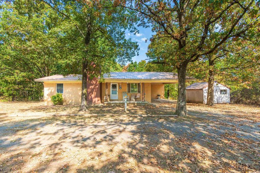 This is a beautiful mountain home!  Just minutes from Heber Springs!  This home has been loving lived in.  2 Bedrooms/2 Baths on a lovely 2 acre lot.    Fireplace has been replaced with a woodburning insert.  The attic fan provides great cooling for much of the year.     Don't miss this great little home!