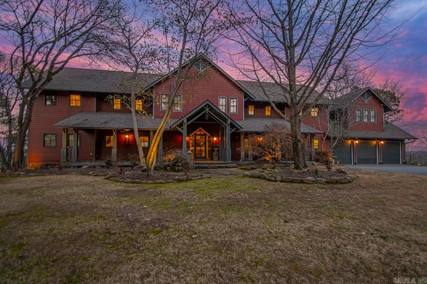 Rare find in Central Arkansas! Welcome to this exquisite property on 5 acres with beautiful views of Pinnacle Mountain off the back deck! This home is covered in privacy in a gated community. Modern meets a little bit of rustic in this updated home. Enjoy morning sunrises from the screened in porch. Relax in the evenings on the deck equipped with a mosquito repellant system, while you watch deer pass through the property. New, detached 3-level shop/garage can hold 12 cars or a wide variety of equipment with 10 and 12 foot tall garage doors. Main level accessible from the driveway is climate controlled. Unfinished 1800 sqft +/- space on a 3rd level for a potential apartment or even a business/office. Own your own piece of heaven on Earth right here in Pulaski County. This is a must see to understand all the amazing features. Agents see remarks and attached list with many updates and valuable details.