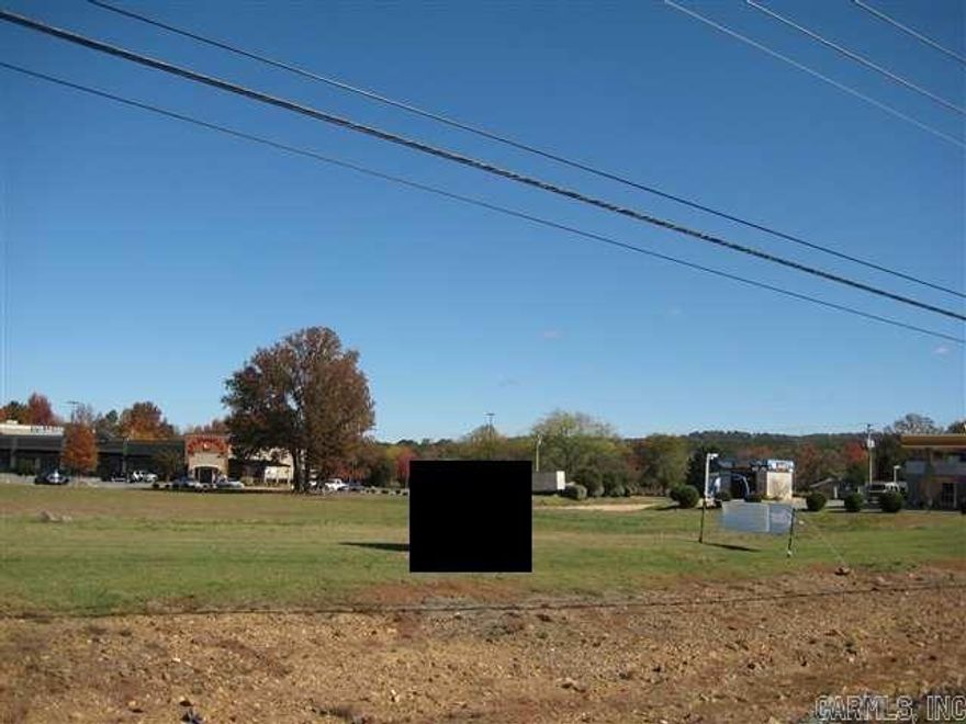 One of the few locations of flat vacant land with a C-3 Zoning. Can not be subdivided. Utilities available/ Not on site. Great place for a Commercial site Frontage on Cantrell with turn lane and traffic light in front of property for great visability. USA Drug has postion across this lot along with other restaurants, business and in the heart of Chenal neighborhoods. Very desirable position for your next business site.    SALE Restricted to no Mexican or like cuisine