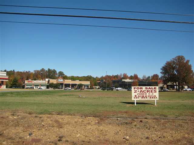 One of the few locations of flat vacant land with a C-3 Zoning. Can not be subdivided. Utilities available/ Not on site. Great place for a Commercial site Frontage on Cantrell with turn lane and traffic light in front of property for great visability. USA Drug has postion across this lot along with other restaurants, business and in the heart of Chenal neighborhoods. Very desirable position for your next business site. SALE Restricted to no Mexican or like cuisine