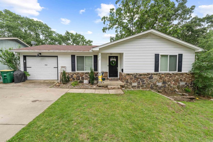 Fantastic value! This spacious property features four bedrooms, three full baths, and two living areas, all boasting recent updates to both kitchen and baths. The open-plan design connects the living room to the kitchen, creating a welcoming atmosphere. The main living area showcases durable LVP flooring, while the bathrooms boast elegant tile finishes. Downstairs, a second living area with tiled flooring provides additional space for relaxation or entertainment, accompanied by a bedroom and a full bath. Plus, several windows have been replaced, enhancing energy efficiency and aesthetics. Step outside onto the back deck and savor al fresco dining amidst the serene natural surroundings. Agents See Remarks. Square footage Estimated, please measure for accuracy. No disclosures will be provided.