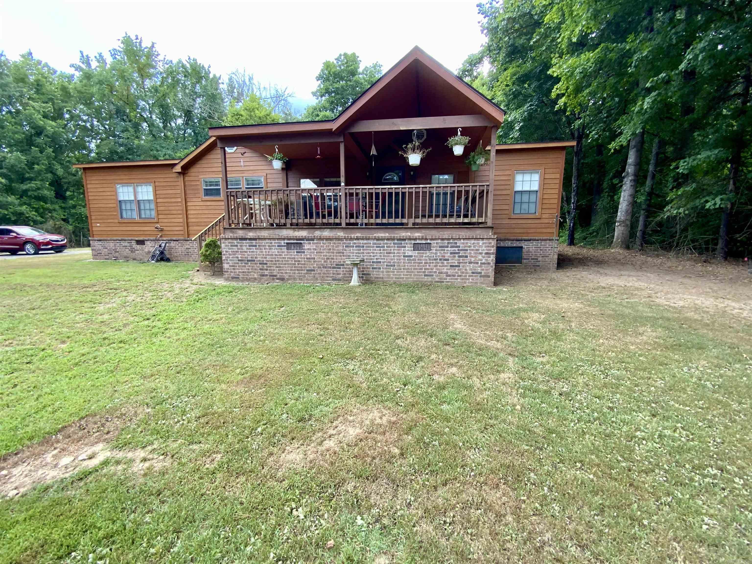 Bring your family and you are minutes to the Little Red River and Greers Ferry Lake!!! Very nice modular home with over 2 acres. This home features Sheetrock walls, New LVP flooring and paint throughout. Outside you will find a separate electrical hookup for RV or whatever you desire. This property offers plenty of room outside for your entertainment. Call today for a tour!!!