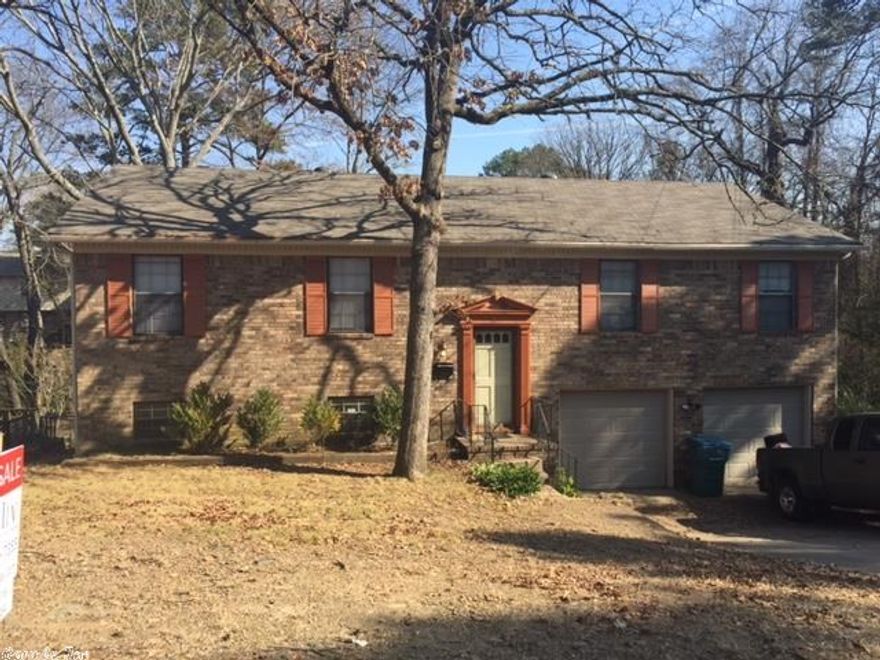 Investor opportunity or perfect for first time home buyers!!If you are looking for a fixer upper with tons of potential, this is it!  PRICED TO SELL.   Lots of space on a quiet and great street. This home has a new roof, deck, furnace.   Laminate hardwood floors through-out. The hot-water heater(commercial) and garage door are less than three years old. Call today for a private showing.