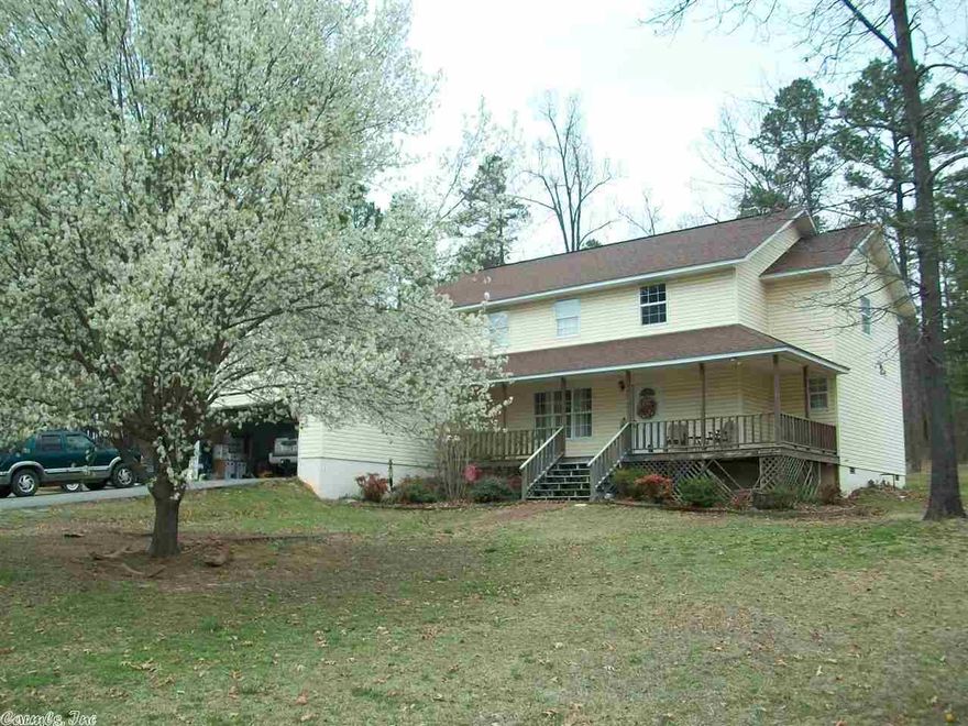 This large 4 bedroom home and 2.5 bath has a 2 car garage. The open concept design in front has a beautiful staircase and tile floors in kitchen, textured walls throughout the house with in the city limits in Ashley Woods addition. Great for large family or multi family.  Call today for more details.