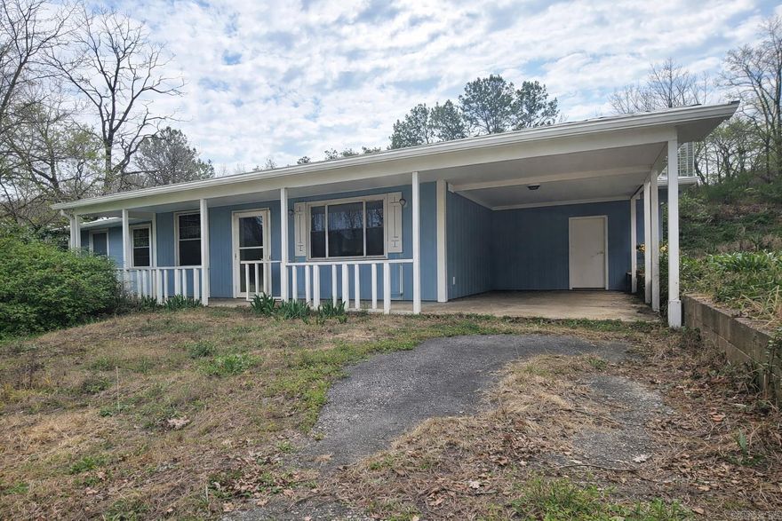 Investor opportunity with strong potential featuring a HUGE Workshop and 3 bed 2 bath home. Perfectly situated between Conway and Vilonia with a private wooded setting. This property needs updates and repairs both inside and out and is being sold as-is. Ideal for investors, renovators, or buyers looking for a project with the chance to add value.