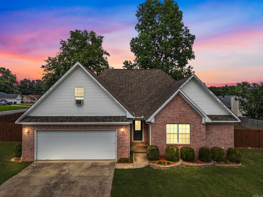 Welcome home! This spacious home, located on a spacious corner lot, features three bedrooms downstairs, with a fourth bedroom or bonus room upstairs. Features include a recently updated garage door opener, a new water heater,  a refrigerator, dishwasher, microwave, an electric range, a fenced yard, and a storage shed!